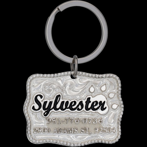 The Sylvester Custom Cat Tag is crafted from durable German Silver, featuring bold black letters and a cat paw unique design. Keep your furry friend stylishly identified. Order now!